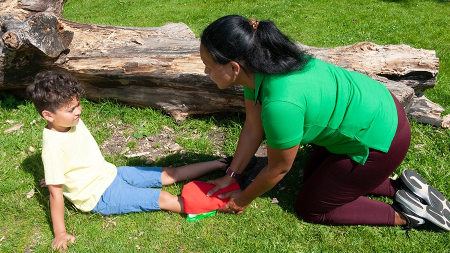 Paediatric first aider responding to a first aid emaergency